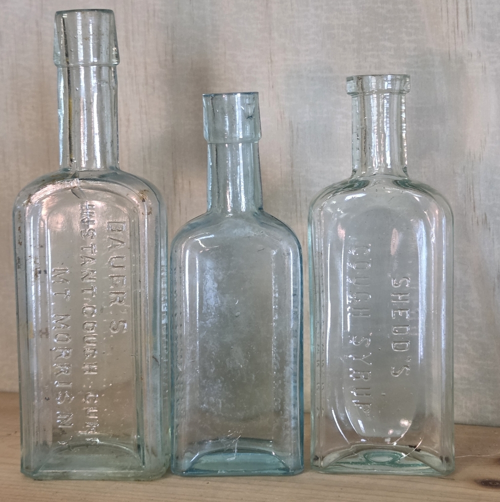 Antique Embossed Glass Medicine Bottles 3